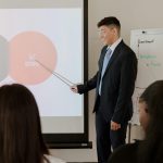 Professional business presentation on growth strategies with a diverse audience.